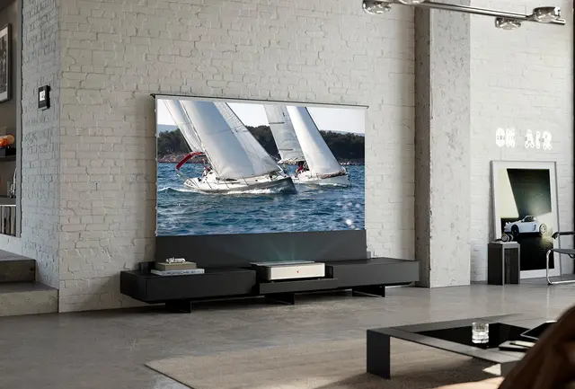 Leica Cine 1 projection in living room showing two sailing boats at the sea.