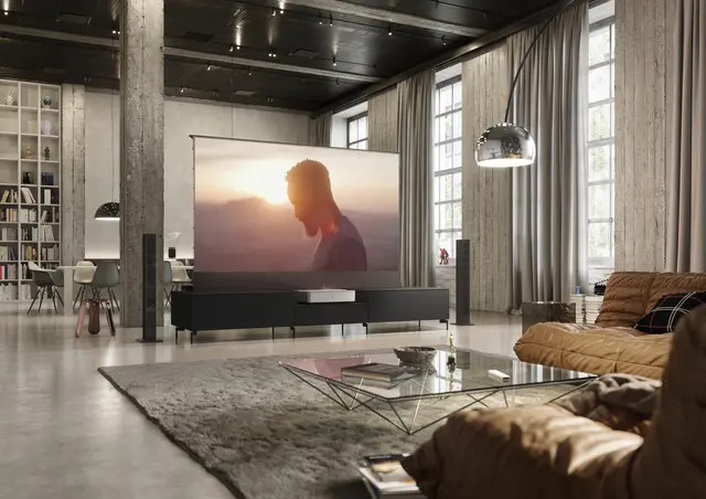 Living room with Leica CIne 1 on TV Lowboard.