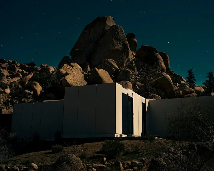 Architectural building in the rocks in the evening sun.