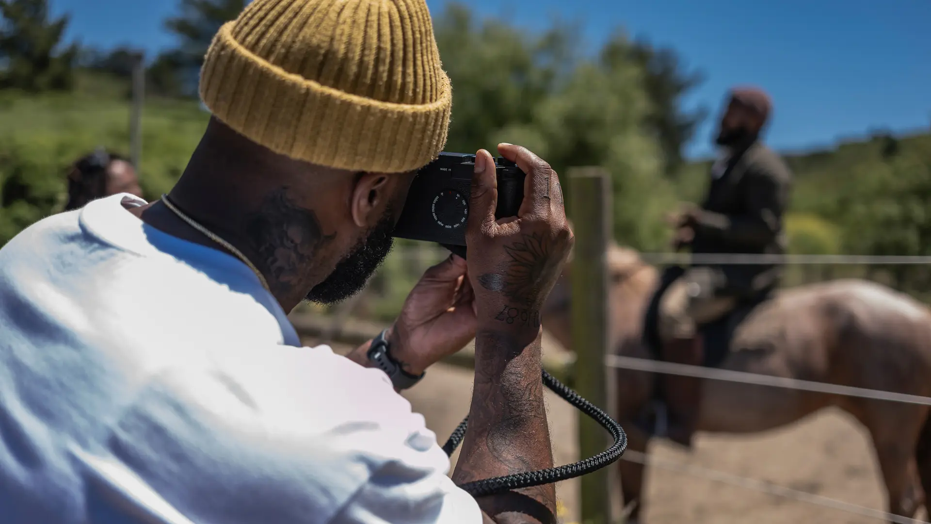 Brandon Ruffin photographs a horse with a Leica Camera
