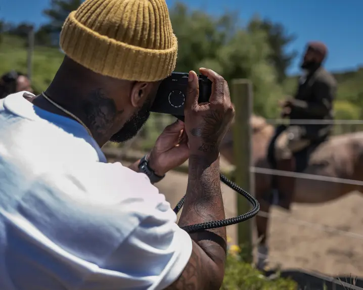 Brandon Ruffin photographs a horse with a Leica Camera