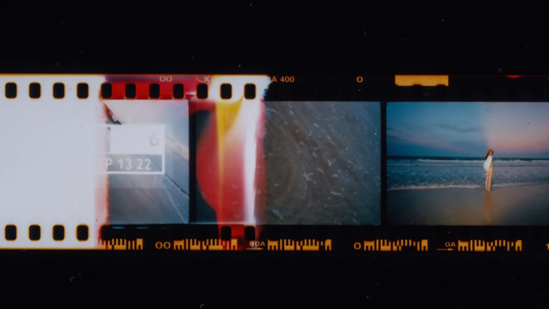 Photographed filmstrip with different images of water and a woman at the sea