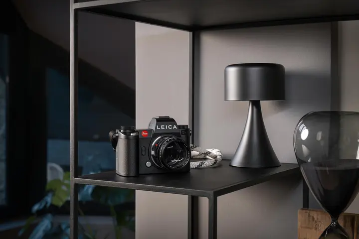 Black Leica Camera on a Table