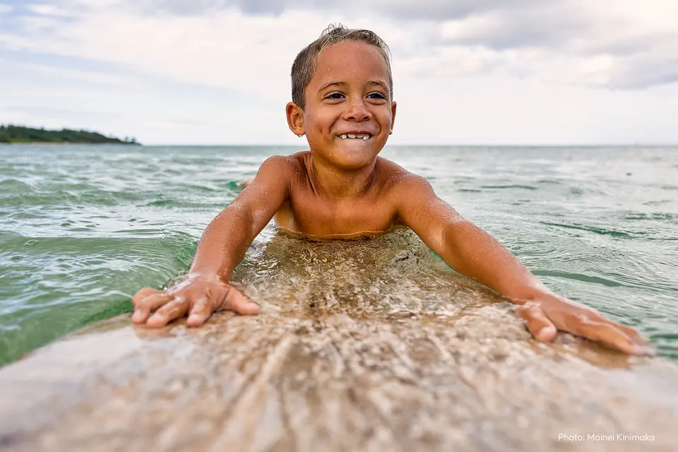 little boy in the sea